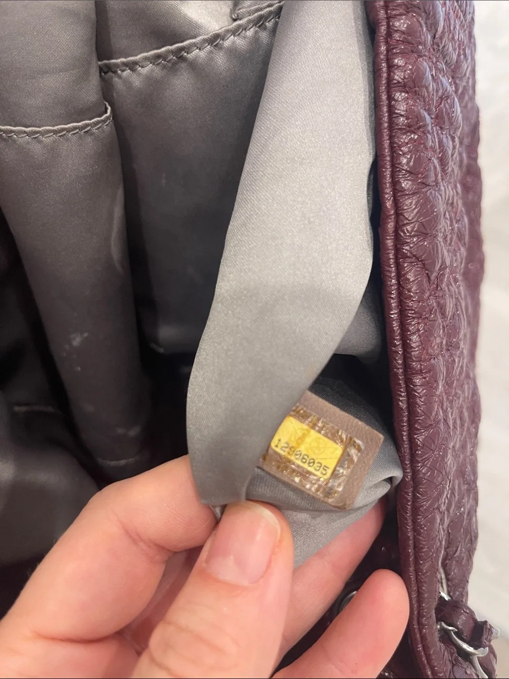Authentic CHANEL Camelia in Bordeaux with CC Charm